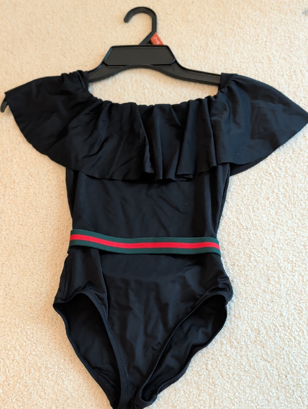 Stella Cove Black Garment with Pink Logo Tag